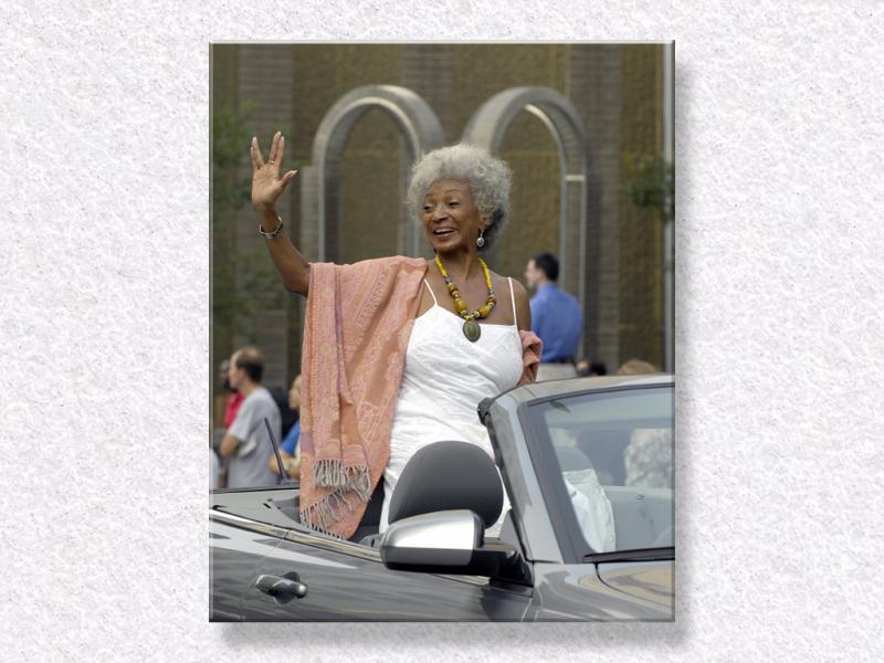 Nichelle Waves at the Crowd...