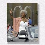 Nichelle Waves at the Crowd...